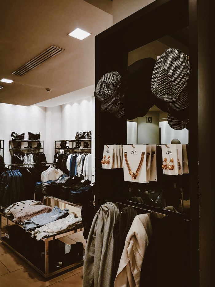Crafting Captivating Headlines: Your awesome post title goes here Stylish retail store showcasing hats and fashionable clothing displays.